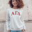 Alpha Gamma Delta Arched Greek Lettered Crewneck Sweatshirt Alpha Gamma Delta Arched Greek Lettered Crewneck Sweatshirt