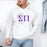 Printify Sigma Pi Crest World Famous Hooded Sweatshirt Sigma Pi Crest World Famous Hooded Sweatshirt