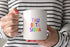 Tau Beta Sigma Coffee Mug with Rainbows