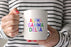 Alpha Gamma Delta Coffee Mug with Rainbows - 15 oz
